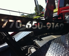 Chrome lettering on tow truck