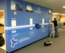 Company History wall with Dibond panels vinyl wall wrap logos and lettering